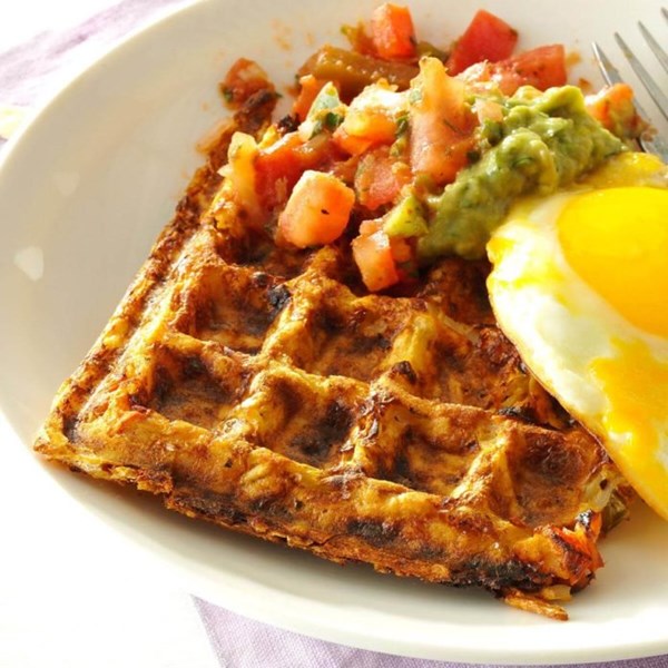 Spicy hash brown waffles with fried eggs