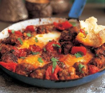 Spicy kefta in tomato sauce with poached egg