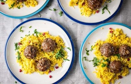 Spicy lamb balls with jewelled rice and cumin yoghurt