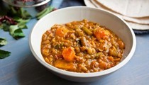 Spicy lentil soup with squash, tomato and green beans (Sambar)