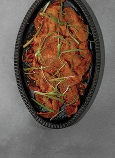 Spicy marinated pork butt (Dweji bulgogi)