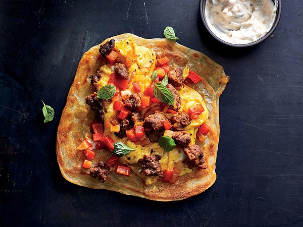 Spicy merguez scramble with lemon-harissa yogurt and Moroccan m'smen