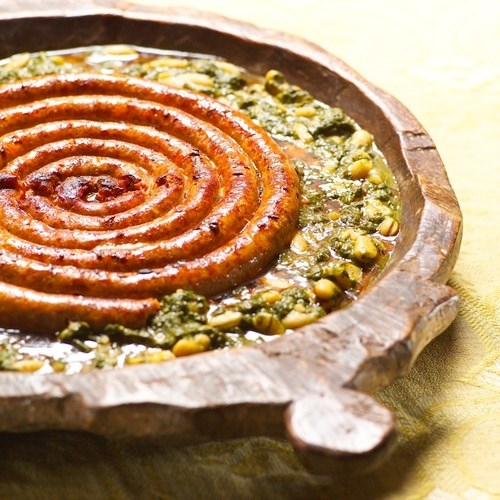 Spicy merguez with spinach and white beans
