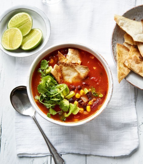 Spicy Mexican tortilla soup with avocado salsa