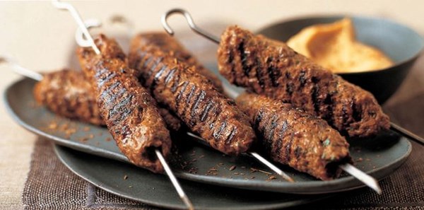 Spicy minced beef kebabs with hummus