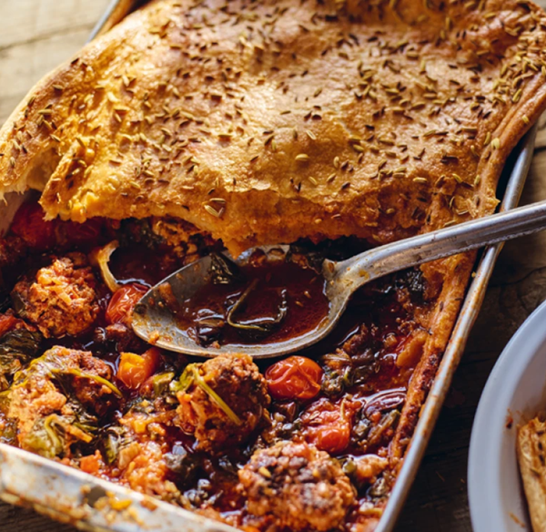 Spicy pork meatball, tomato and olive pie
