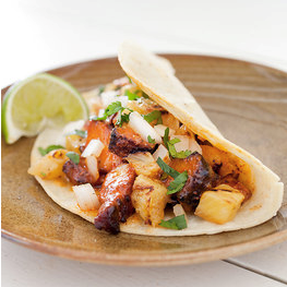 Spicy pork tacos (Tacos al pastor)