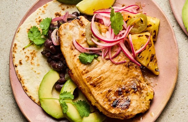 Spicy pork with charred pineapple, jalapeños & black beans