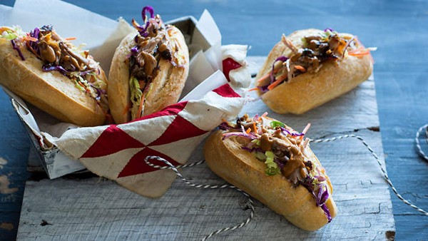 Spicy pulled pork rolls with coleslaw and barbecue sauce