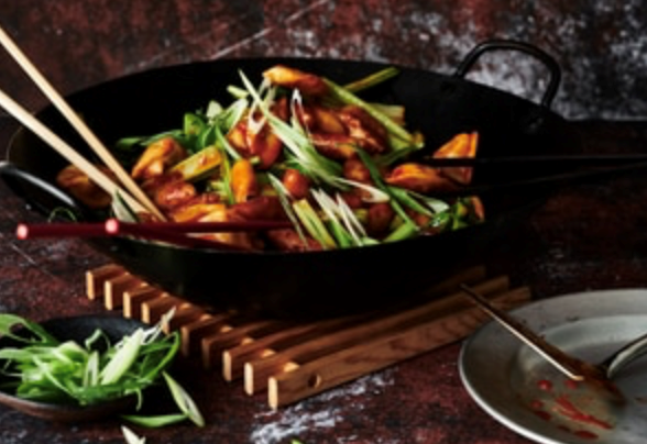 Spicy rice cake, dumpling and greens stir-fry