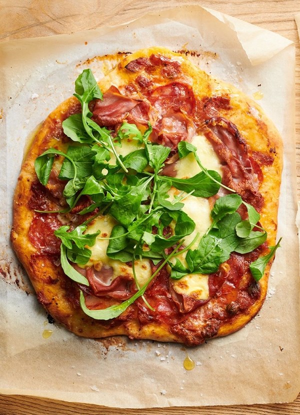 Spicy salami, prosciutto and mozzarella pizza