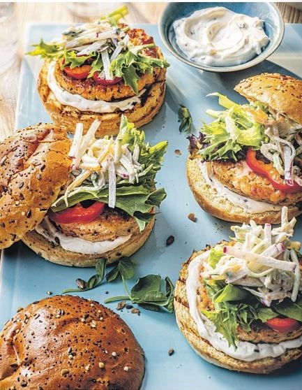 Spicy salmon burgers with sour cream slaw