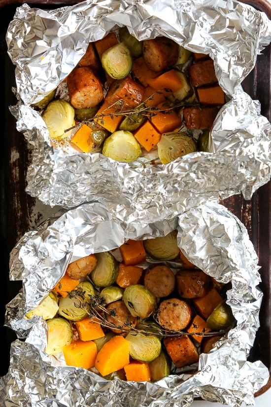 Spicy sausage and Brussels sprouts foil packets