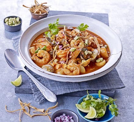 Spicy seafood stew with tomatoes & lime