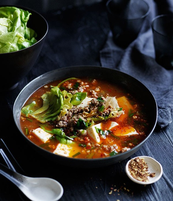 Spicy Sichuan-style soup with pork, lettuce and soft tofu