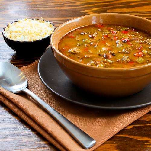 Spicy slow cooker soup with ground turkey, pinto beans, red bell pepper, and green chiles