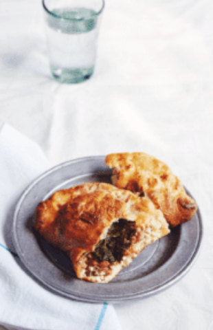 Spicy spinach and sausage calzones