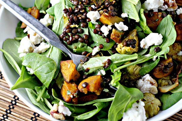 Spicy squash salad with lentils, Brussels sprouts and goat cheese