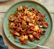 Spicy squid ragu with pasta & clams