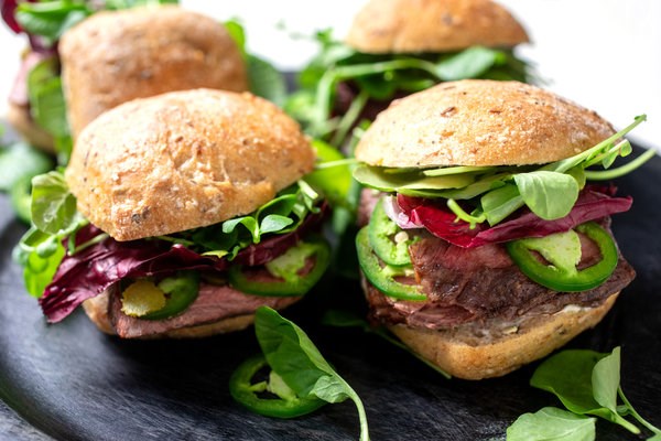 Spicy steak and watercress on a roll