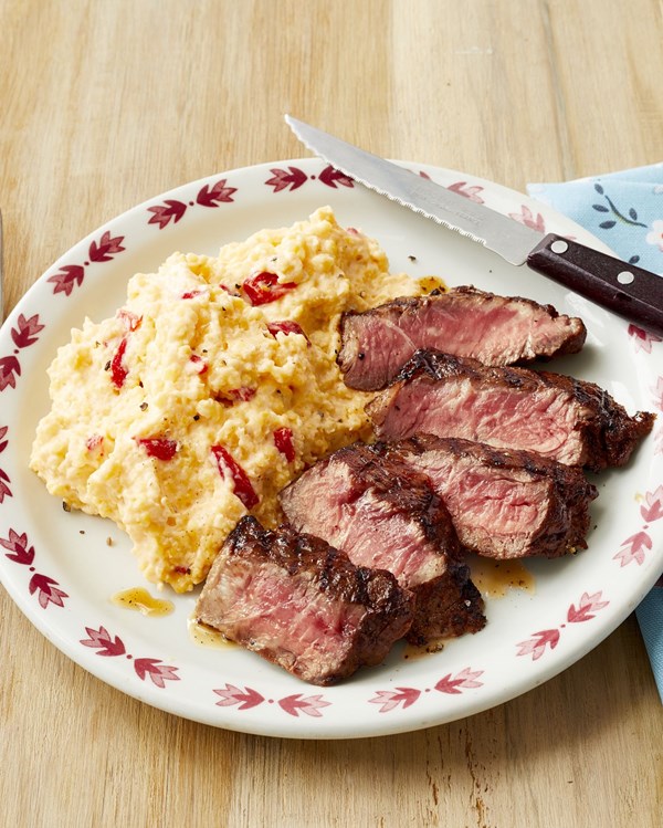 Spicy steak with pimiento cheese grits