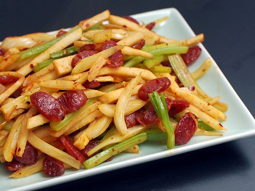 Spicy stir-fried fennel, celery, and celery root with Chinese sausage