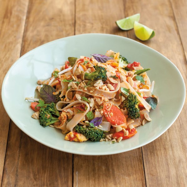 Spicy Thai noodles with vegetables and basil