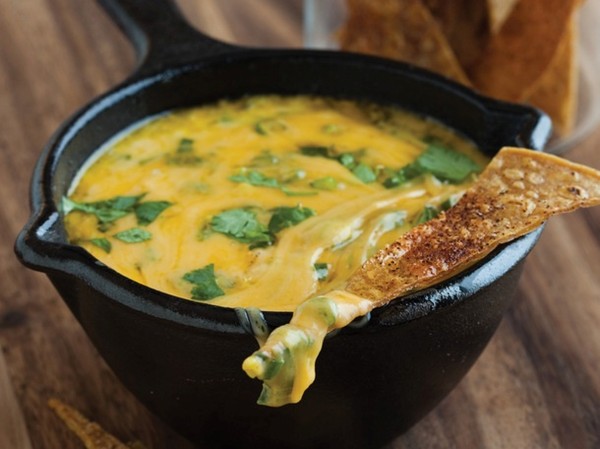 Spicy tortilla crisps with queso fundito from 'Salty Snacks' (Cook the Book)