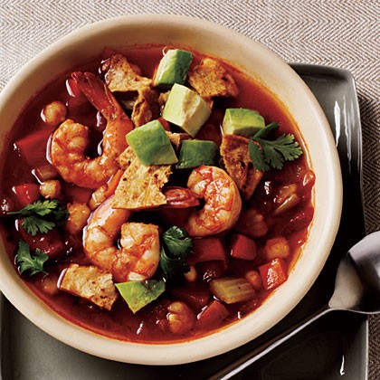 Spicy tortilla soup with shrimp and avocado