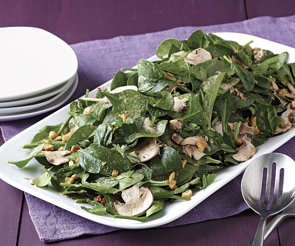 Spinach and mushroom salad with miso-tahini dressing