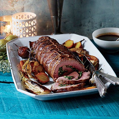 Spinach and mushroom-stuffed beef tenderloin with truffled wine sauce