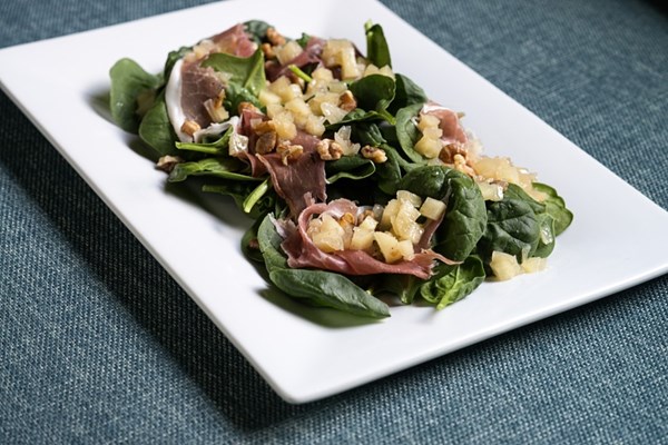 Spinach and prosciutto salad with apple-onion vinaigrette