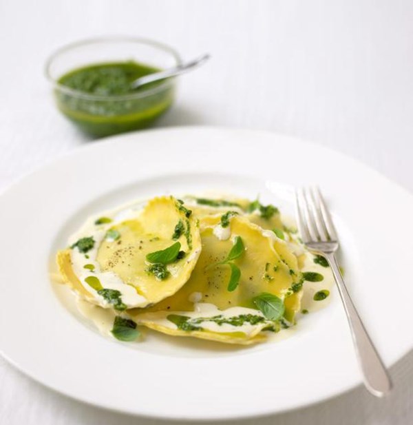 Spinach and ricotta ravioli with walnut pesto and a cream and basil sauce [Chris Gates]