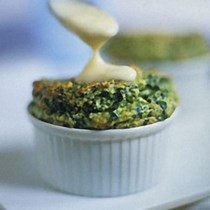 Spinach and ricotta soufflés with anchovy sauce