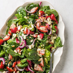 Spinach and strawberry salad with poppy seed dressing
