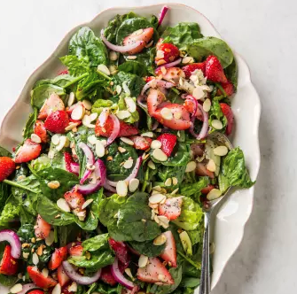Spinach and strawberry salad with poppy seed dressing