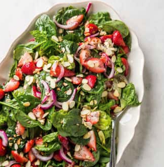 Spinach and strawberry salad with poppy seed dressing