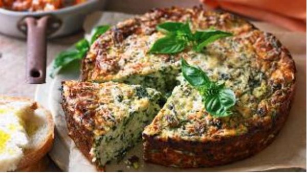 Spinach and zucchini ricotta cake with tomato and eggplant