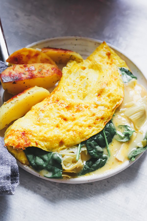 Spinach, artichoke, and Brie omelets