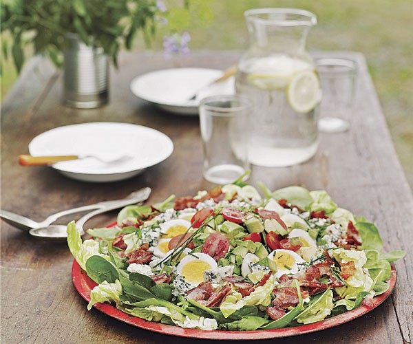 Spinach Cobb salad with bacon, blue cheese, avocado, & Derby dressing