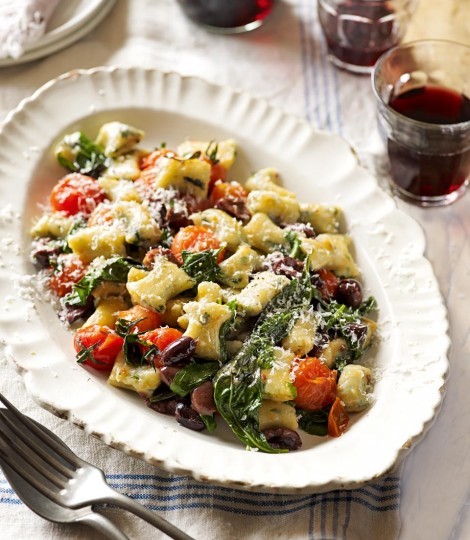 Spinach gnocchi with blistered cherry tomatoes, basil and olives