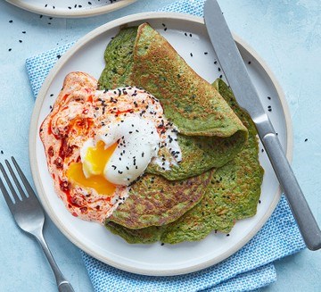 Spinach pancakes with harissa yogurt & poached eggs
