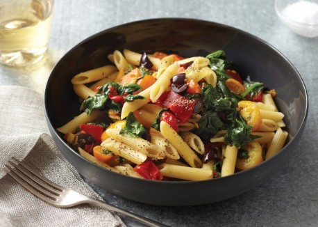Spinach, peppers, and cherry tomatoes with penne rigate