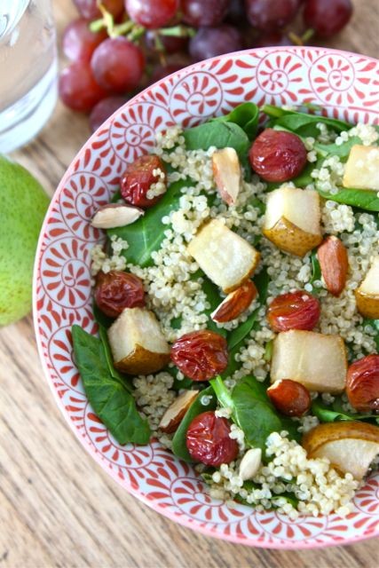 Spinach quinoa salad with roasted grapes, pears, and almonds
