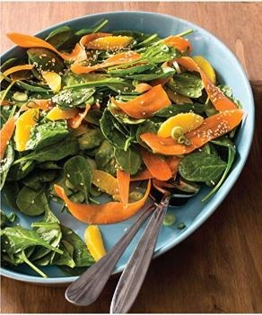 Spinach salad with carrots, oranges, and sesame