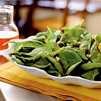 Spinach salad with Gorgonzola, pistachios, and pepper jelly vinaigrette