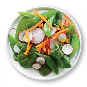 Spinach salad with sugar snap peas and carrot