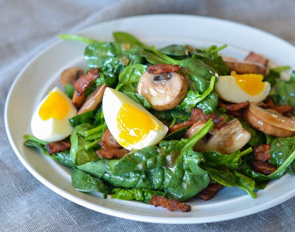 Spinach salad with warm bacon dressing