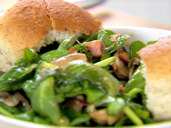 Spinach salad with warm bacon dressing