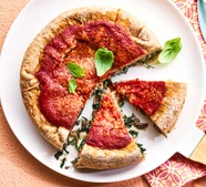 Spinach-stuffed pizza pies